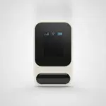 Hotspot Wi-Fi 4G de poche crème vu de face, debout sur un fond gris clair uni, écran noir à icônes de réseau, Wi-Fi et batterie